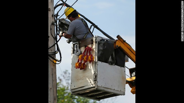 A worker reconnects wires on July 9.