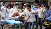 CHINA: Asisten a los afectados (AP).
