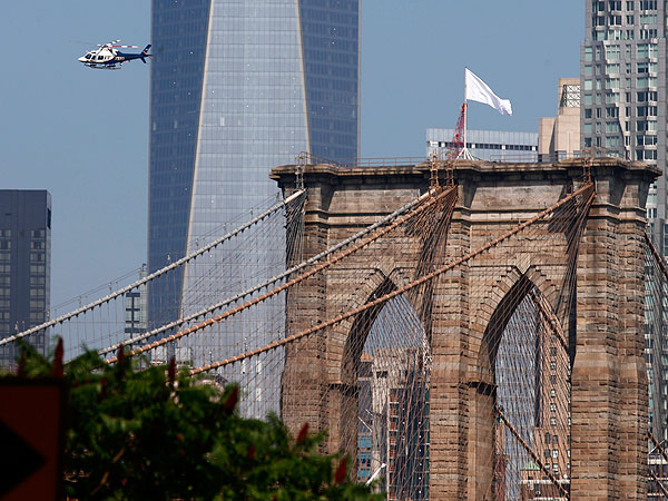 Brooklyn Bridge Mystery: Police Hunt for Vandals Who Swapped American Flags for White Ones