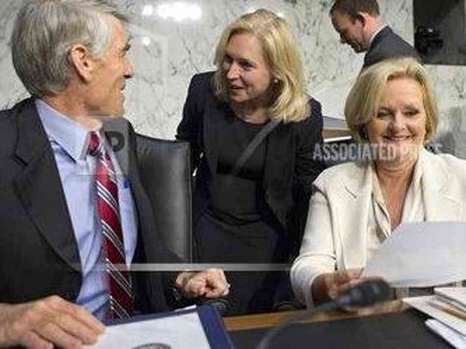 New York Sen. Kirsten Gillibrand, center, and Missouri Sen. Claire McCaskill, right, are at odds over the best way to respond to military sexual assaults.