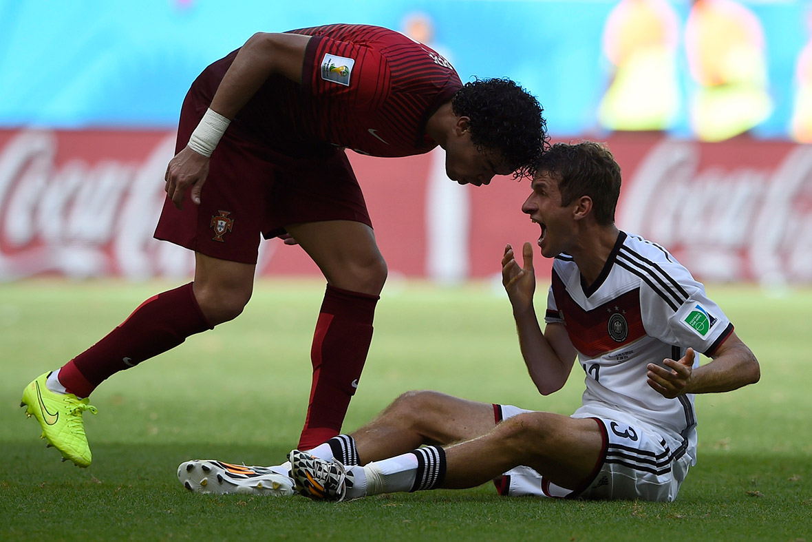 Portugal's Pepe headbutts Germany's Thomas Mueller, earning him a red card, during their World Cup match at the Fonte Nova arena in Salvador