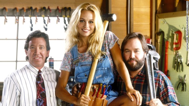 Tim Allen, Anderson and Richard Karn in "Home Improvement," where Anderson played Tool Girl, Lisa. 