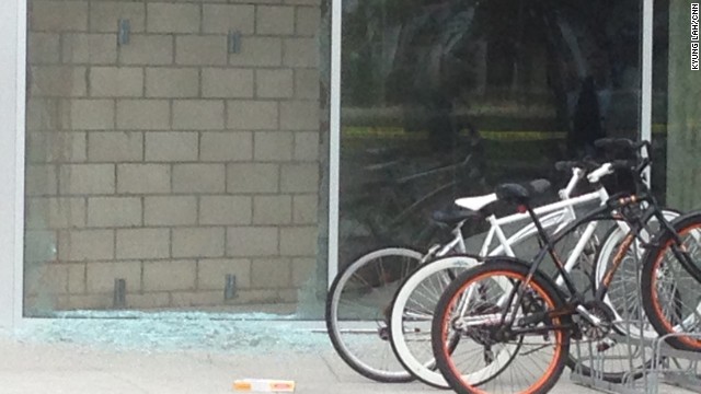 Broken glass at the shooting scene Saturday. Authorities said there were multiple crime scenes. 