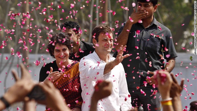 Rahul Gandhi, one of the leading candidates for prime minister, waves to supporters in Amethi, India, as he arrives to file his nomination on April 12.