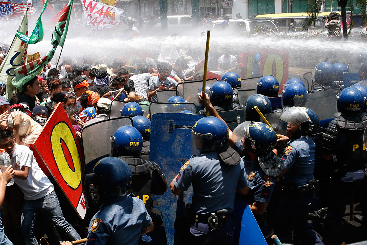 Police use a water cannon on 