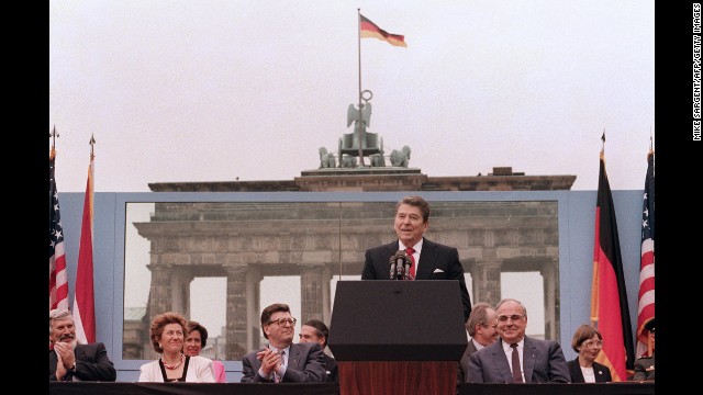 President Reagan, commemorating the 750th anniversary of Berlin, addresses the people of West Berlin at the base of the Brandenburg Gate, near the Berlin Wall on June 12, 1987. Due to the amplification system being used, the President's words could also be heard on the Eastern (communist-controlled) side of the wall. "Tear down this wall!" was the famous appeal by Reagan, directed at Gorbachev, to destroy the Berlin Wall. The address Reagan delivered that day is considered by many to have affirmed the beginning of the end of the Cold War and the fall of the Soviet bloc. 