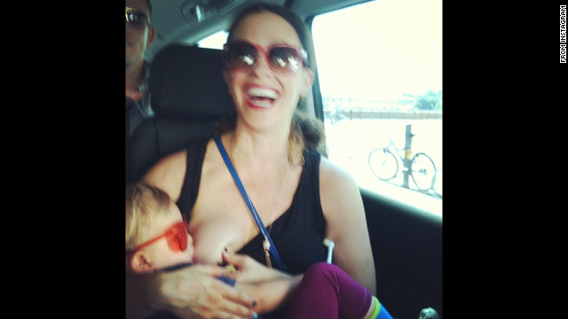 Singer Alanis Morissette posted this more down to earth photo of herself breastfeeding her son Ever while on tour. <a href='http://ift.tt/1zJPMVw' target='_blank'>Her message</a>: "family on tour ;) europe 2012 #worldbreastfeedingweek #isupportyou."