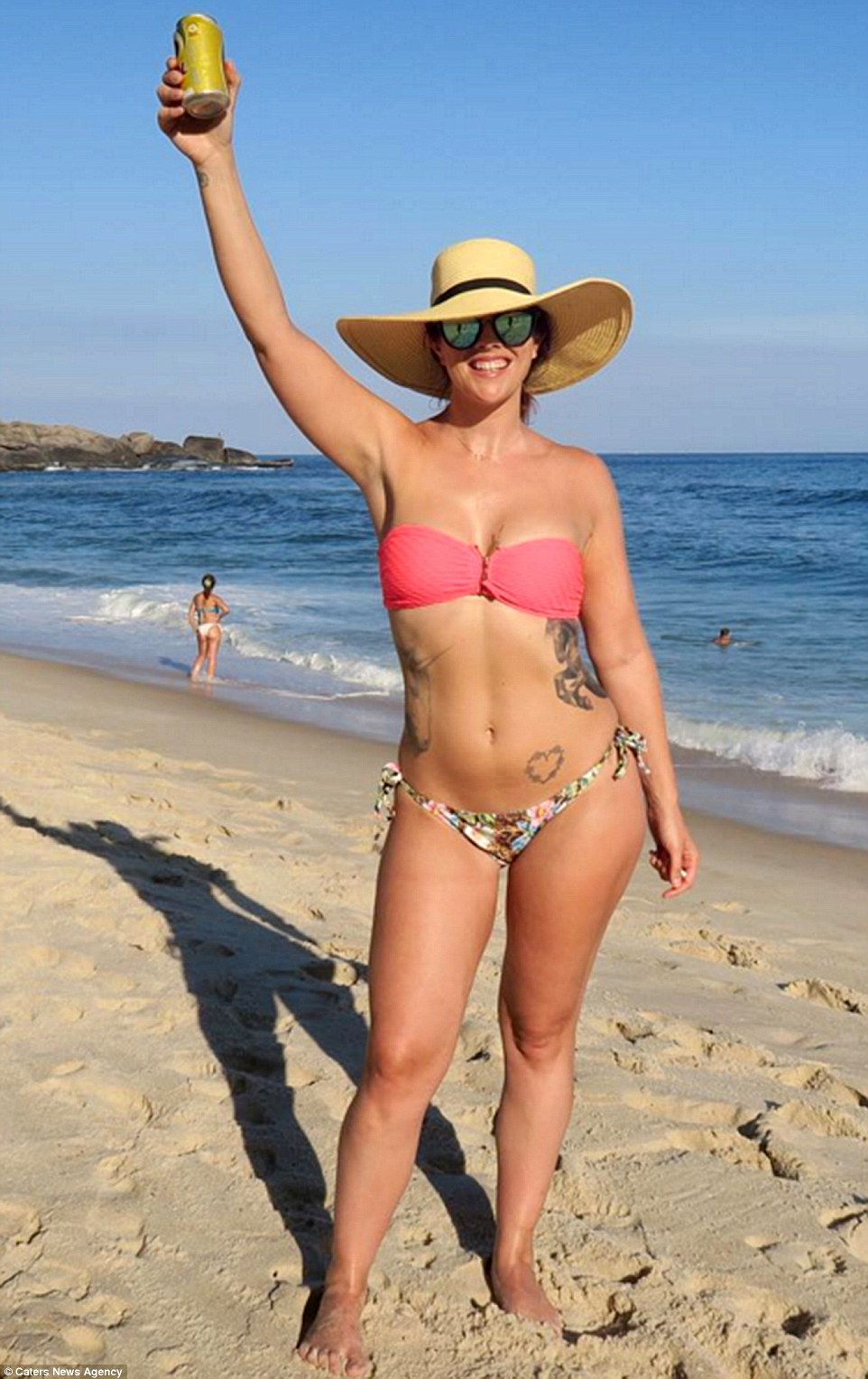 New life: Former BBC presenter, Claira Hermet, 28, from London, pictured in Prainha Brazil after her breasts were removed, embarked on a globe-trotting adventure after undergoing a double mastectomy and breast reconstruction surgery in January 2015