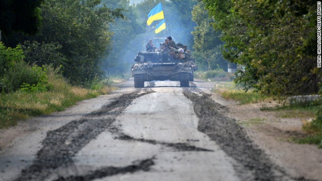 Ukrainian troops patrol near the village of Novoselovka on Thursday, July 31.