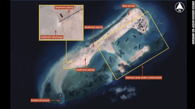 Airbus Defence and Space imagery dated November 14, 2014 shows land reclamation operations under way at Fiery Cross Reef. Multiple operating dredgers provide the ability to generate terrain rapidly. Operating from a harbour area, dredgers deliver sediment via a network of piping. Image courtesy IHS Jane's Defense Weekly.
