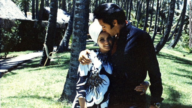 Then-wife Priscilla Presley poses with Elvis Presley in 1968.