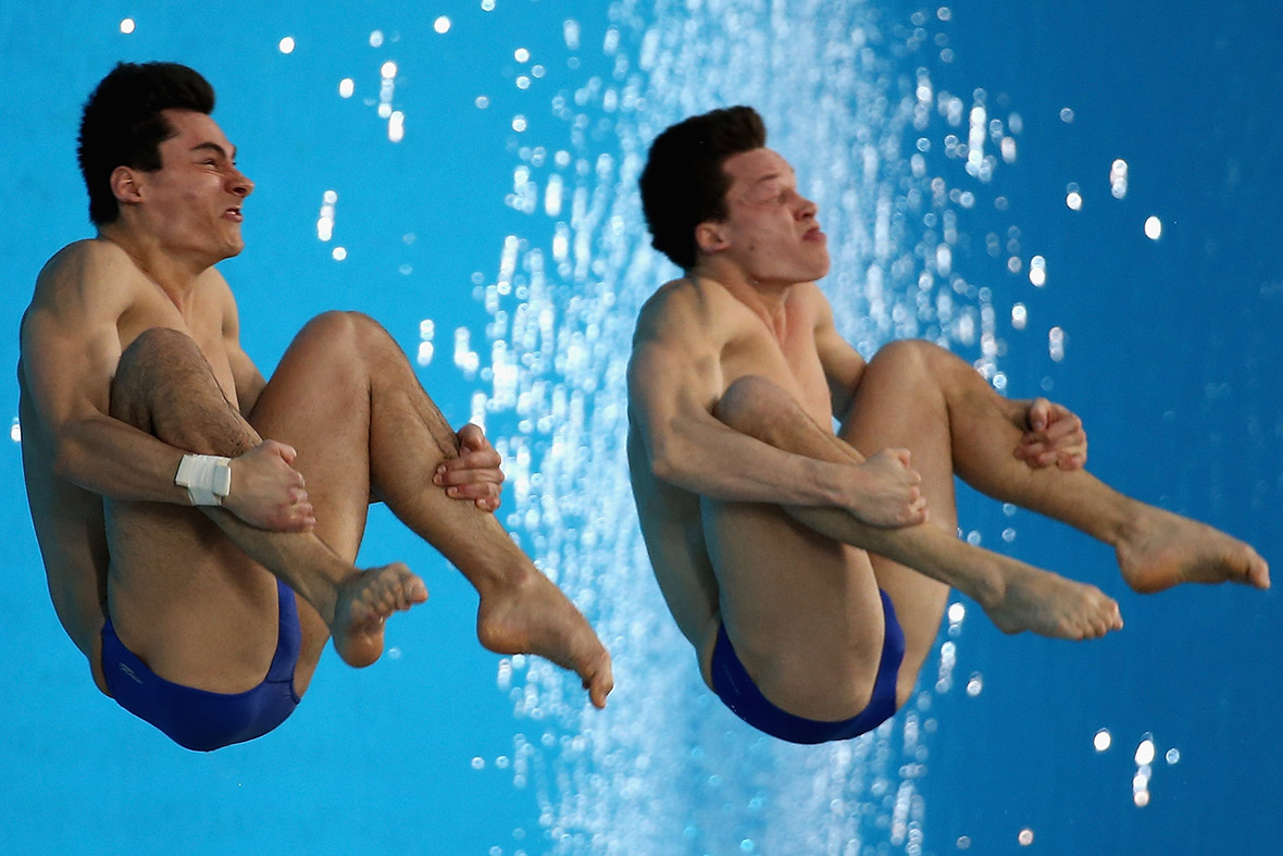 Stephan Feck and Patrick Hausding of Germany dive in the Men's 3m Synchro Springboard Final