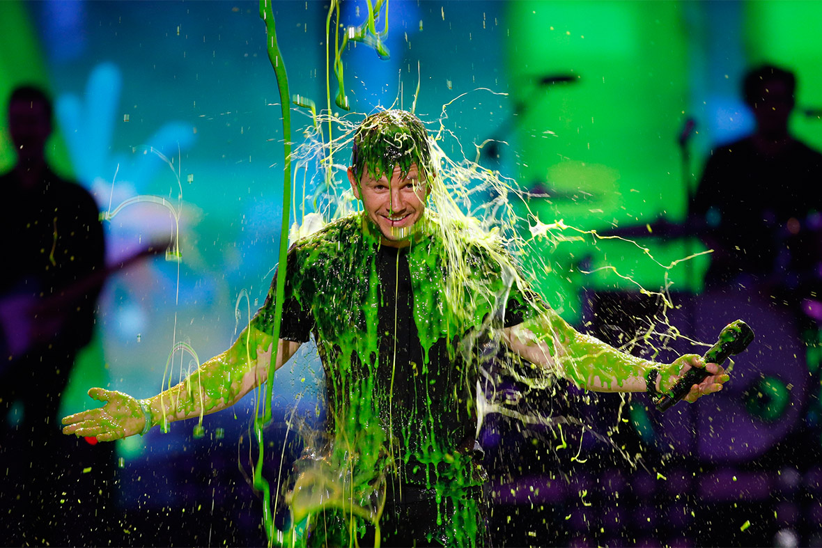 Show host Mark Wahlberg gets slimed on stage at the 27th Annual Kids' Choice Awards in Los Angeles
