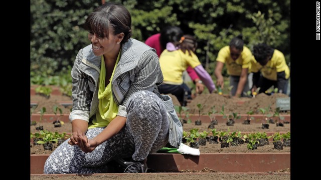 Michelle Obama plants the White House Kitchen Garden on the South Lawn of the White House in April. To help her, she invited students from schools "that have made exceptional improvements to school lunches." It was part of the first lady's "Let's Move" campaign, which she launched in 2010 to reduce childhood obesity. 