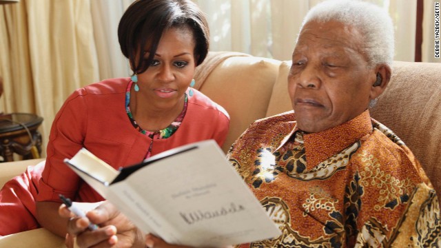 The first lady meets with former South African President Nelson Mandela in June 2011.