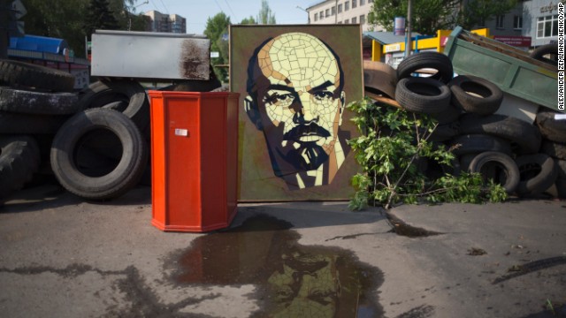 A portrait of Bolshevik leader Vladimir Lenin is part of a barricade in the center of Slovyansk on May 3. The city has become the focus of an armed pro-Russian, anti-government insurgency that aspires to give the eastern regions of Ukraine full autonomy. 