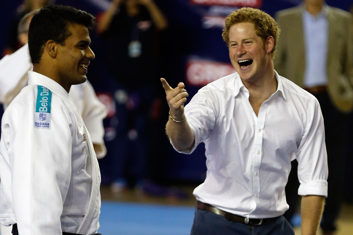 Prince Harry laughs after a judo teacher missed a basket