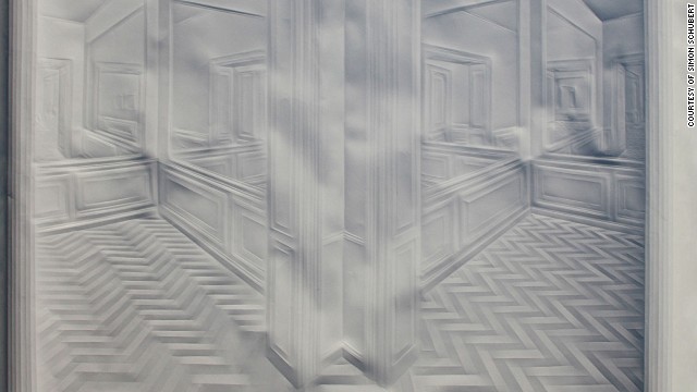 Much of Simon Schubert's work has an architectural theme. The absence of color creates a ghostly, ethereal effect that ironically attracts attention in galleries because of its lack of color.