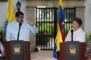 El presidente de Venezuela, Nicolás Maduro (i), pronuncia su discurso junto al mandatario colombiano, Juan Manuel Santos (d), durante una rueda de prensa conjunta en la ciudad de Cartagena (Colombia). EFE/Archivo