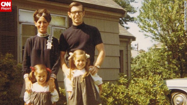 Michelle Jones stands with her sister and parents outside her grandparents' home in Newton, Massachusetts, in this 1968 photograph. "I loved the outfits my mom wore. Always the latest fashion. Big eyelashes and big makeup," she said.