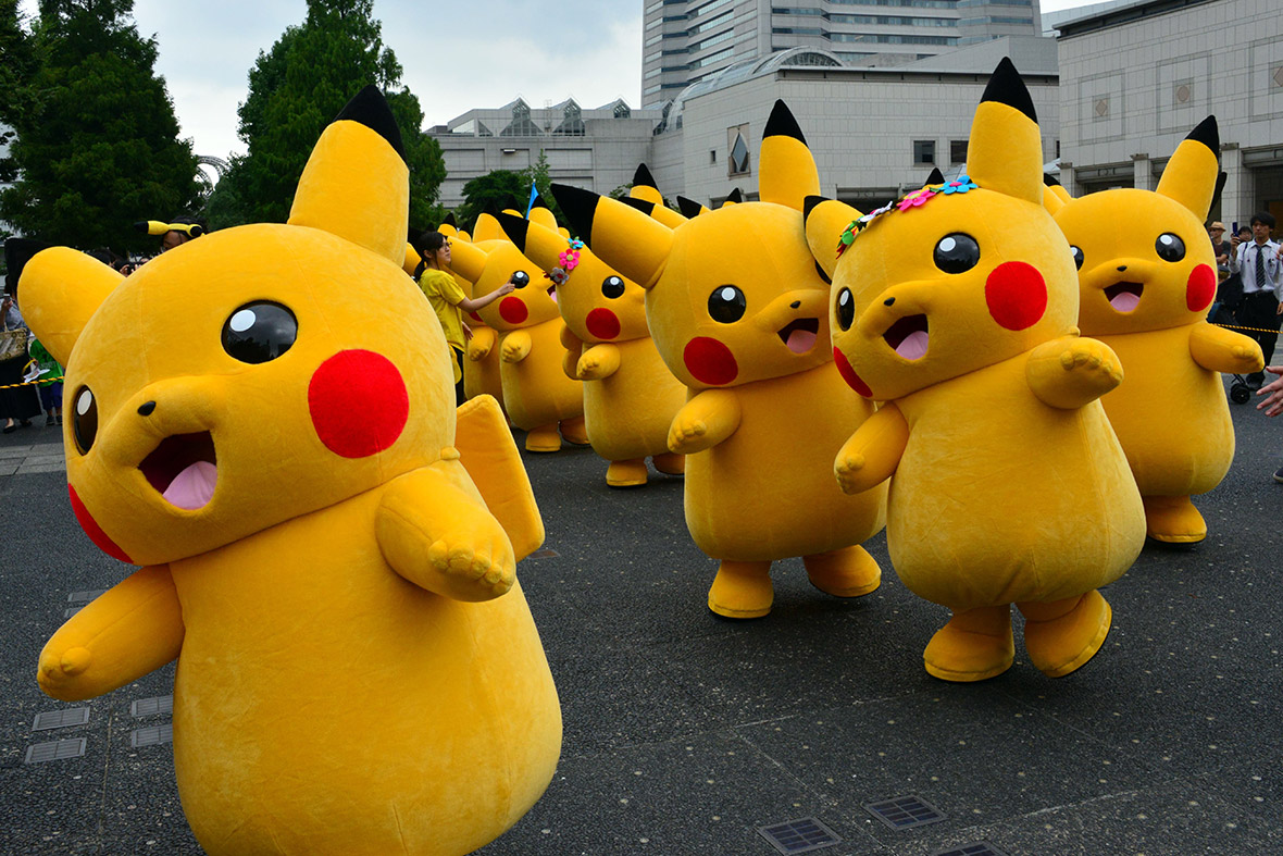 Dozens of giant Pikachus parade at the Landmark Plaza shopping mall in Yokohama, as part of the 