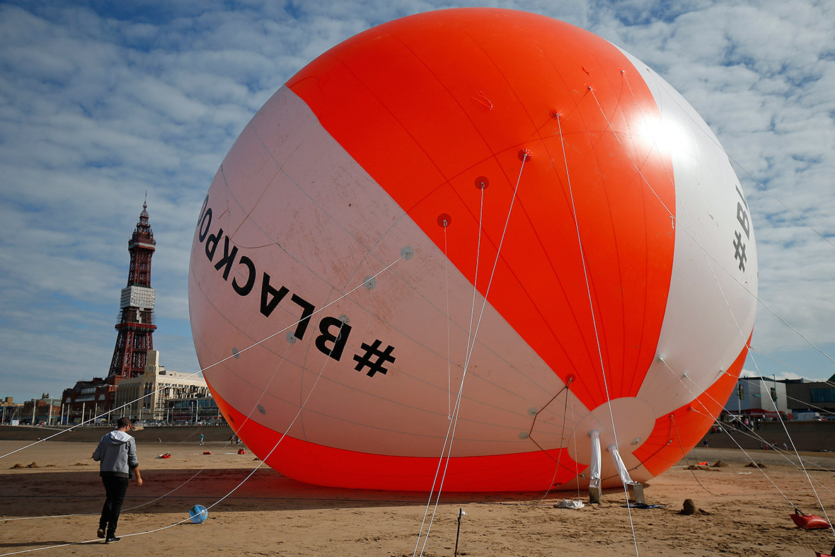 A giant beach ball sits on the sand in Blackpool, northern England. The ball was inflated to a height of 16.6 metres, beating the previous world record of 15.8 metres