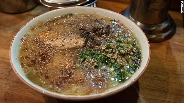 Kumamoto ramen's garlic hit comes in the form of black oil called mayu. Served with extra garlic chips on the side, it's a great late night snack.