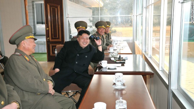A picture released on Tuesday, March 18, by the KCNA shows Kim attending a shooting practice at a military academy in Pyongyang, North Korea. 