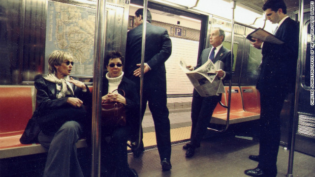 Bloomberg, second from right, rides to City Hall on the R train in March 2002 after New York transit workers authorized union leaders to call a strike. Bloomberg, dealing with a $1 billion budget shortfall, had refused union demands for a 24% wage increase over three years. The strike was <a href='http://ift.tt/1l43dMd'>called off</a> in December 2002 after transit workers and their management worked out a deal.