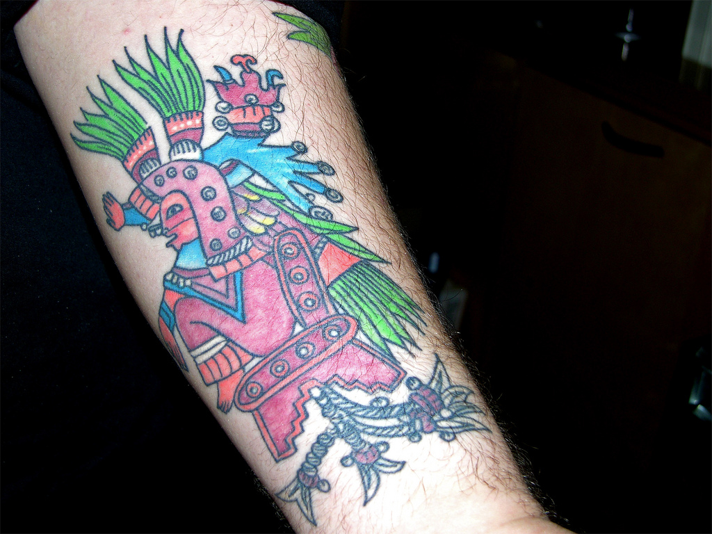 Aztec inspired forearm tattoo
