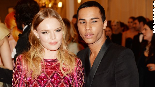 His designs have a loyal celebrity following, including actress Kate Bosworth, who Rousteing is pictured with at last year's Met Gala. 