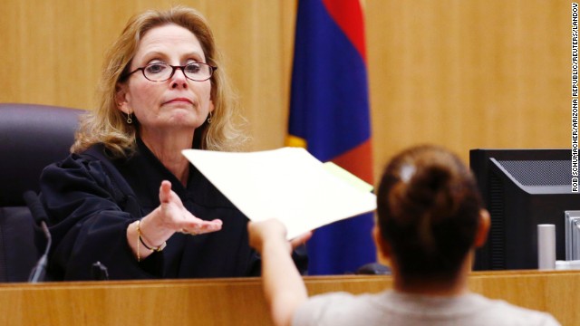 Judge Sherry Stephens receives the jury's decision on May 8. The jury, which has been in court since January 2, heard closing arguments on Friday, May 3. Jurors deliberated for 15 hours and five minutes.