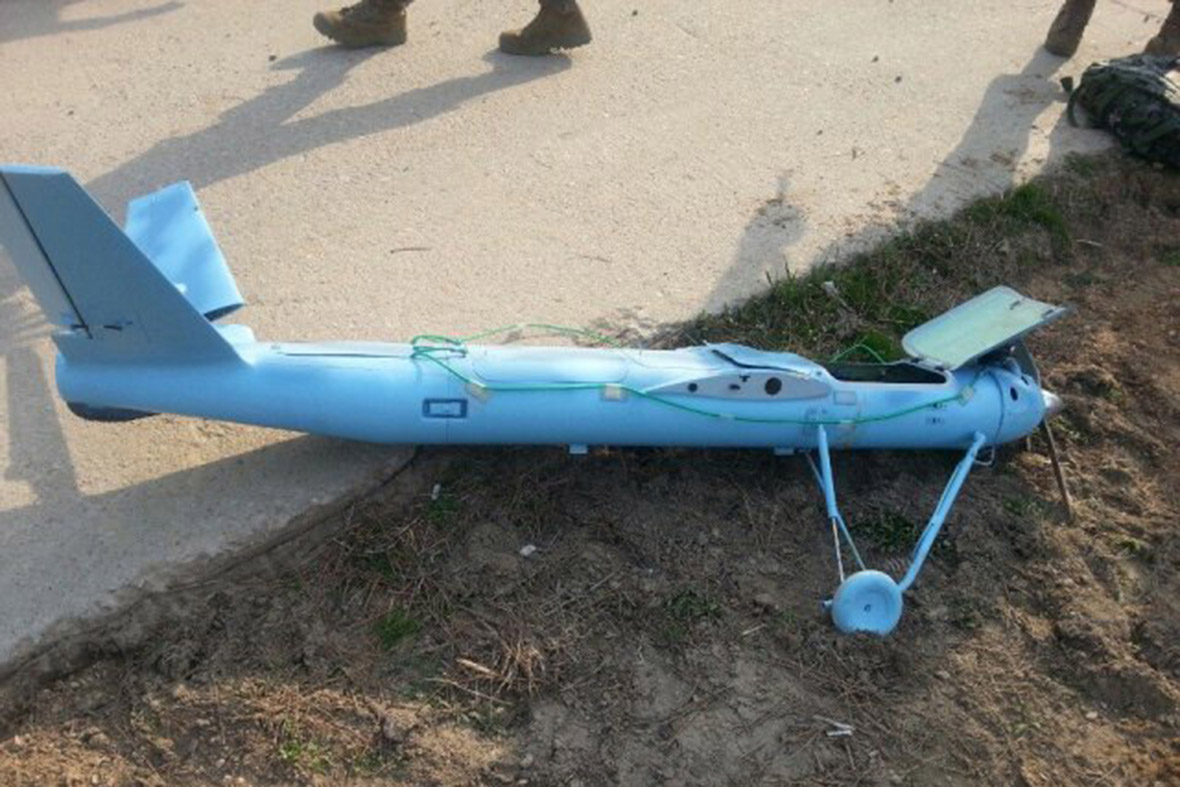 The wreckage of a crashed drone is seen on Baengnyeong Island on 31 March 2014.