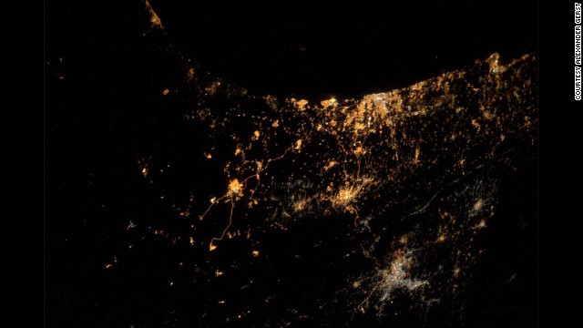 A photograph <a href='http://ift.tt/1A7dufg' target='_blank'>tweeted by astronaut Alexander Gerst</a> on Wednesday, July 23, shows major cities of Israel and Gaza. Gerst said in his tweet: "My saddest photo yet. From #ISS we can actually see explosions and rockets flying over #Gaza &amp; #Israel."