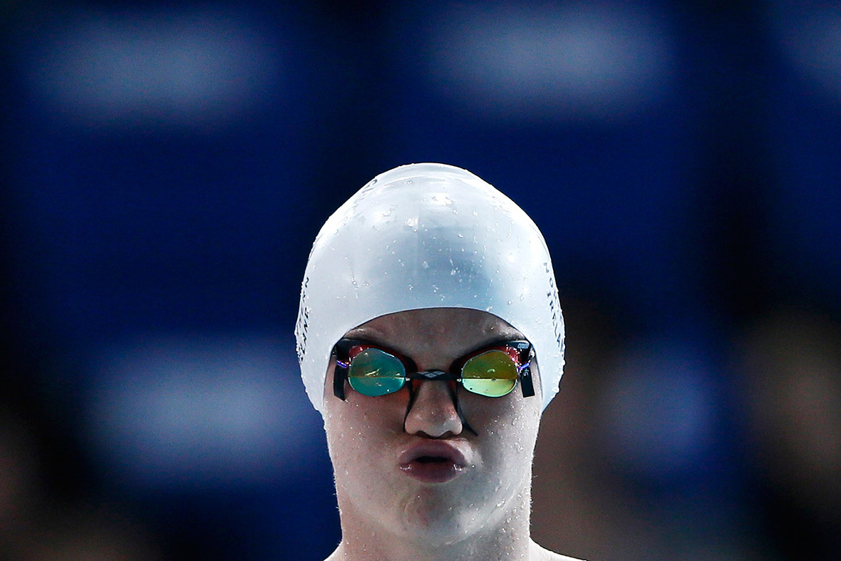 Conor Munn from Northern Ireland prepares for the men's 50m butterfly heats during the 2014 Commonwealth Games in Glasgow