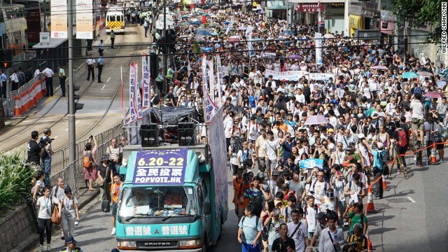 A van bearing the logo of Hong Kong's unofficial referendum led the procession out of Victoria Park. Nearly 800,000 people voted between June 20 and 29, in a vote that Chinese state media called an "illegal farce."