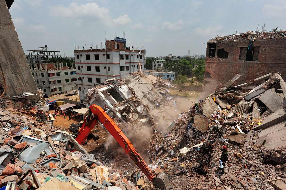 May 2, 2013: The remaining standing part of the Rana Plaza building collapses as the army continues to search the rubble for bodies