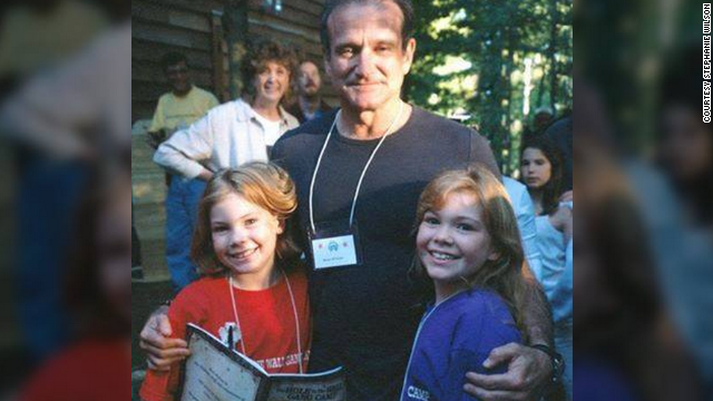 At age 9, <a href='http://ift.tt/1kBdxLH'>Stephanie Wilson</a>, left, met Robin Williams while at a camp for sick children. In 1999, she got to perform with Williams at a fundraising gala. "He was hilarious. I wish he had known how much we appreciated him," she said.