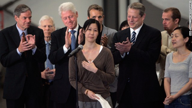 Journalist Laura Ling speaks in front of Euna Lee, former Vice President Gore and former President Clinton after Ling and Lee arrived in Burbank, California, on August 5, 2009, after being released by North Korean authorities. Ling and Lee, of San Francisco-based Current TV, were arrested by North Korea in March for illegally entering the country on the Chinese border. They were pardoned by President Kim Jong-Il after a meeting with Clinton. Ling and Lee had been sentenced to 12 years in prison. 