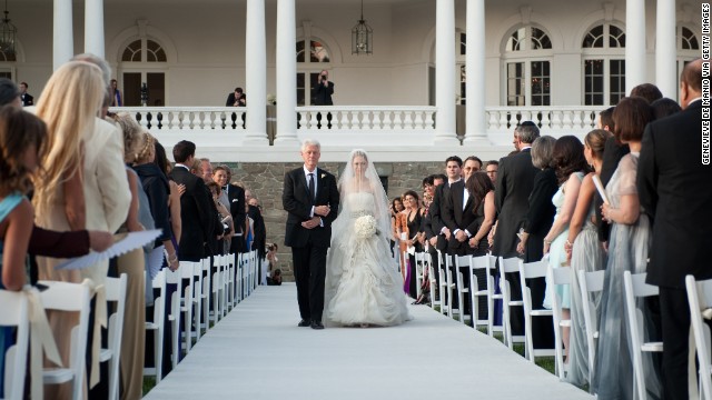 The former President walks his daughter Chelsea down the aisle during her wedding to Marc Mezvinsky at the Astor Courts Estate in Rhinebeck, New York, on July 31, 2010. 