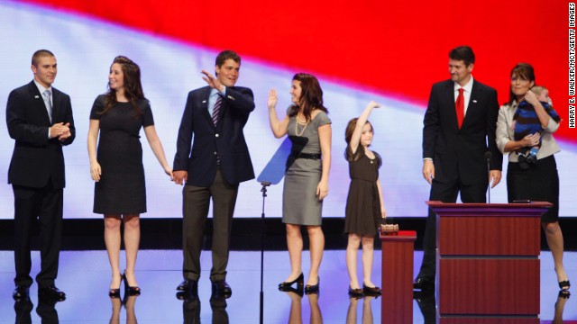 Sarah Palin's family, from left to right, son Track; daughter Bristol; Bristol's then-fiancee Levi Johnston; daughter Willow; daughter Piper; husband Todd and infant Trig, on stage after her speech to the Republican National Convention in September 2008.
