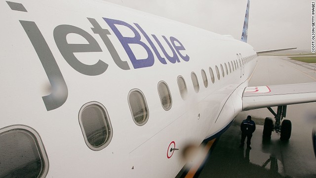 A JetBlue passenger claims that her tweets got her removed from a flight.
