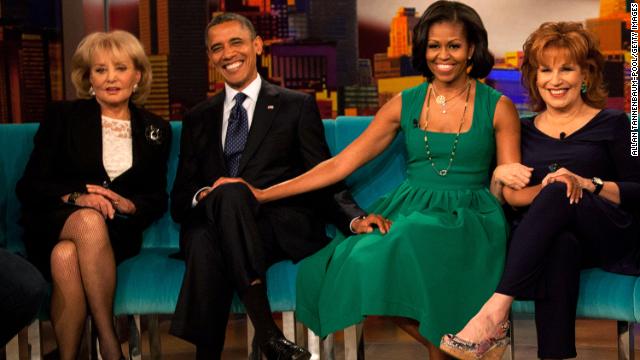 Walters sits for a photo with President Barack Obama, first lady Michelle Obama and Joy Behar on the set of "The View" in September 2012 in New York. 