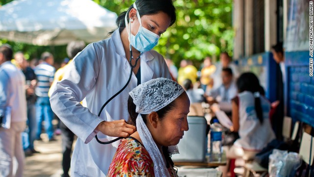 It's a disease with an exotic name, painful symptoms and no treatment or vaccine. It's endemic in Asia and Africa, and it recently spread to the Americas -- where nearly 1 million people have been infected and 150 have died. Here, a doctor examines a patient in El Salvador for signs of Chikungunya.