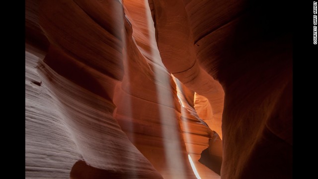 Get to Arizona's Antelope Canyon when the sun is at its highest, travel photographer Gary Arndt says, to see this light streaming through the slot canyon.