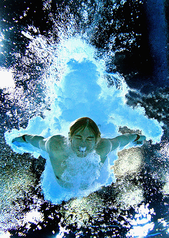 Matthew Mitcham of Australia plunges into the pool during the men's 10m platform final at the Commonwealth Games