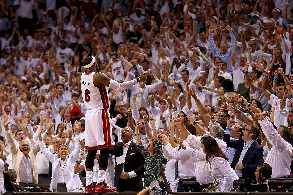 LeBron James of Miami Heat acknowledges the crowd's adulation after the Eastern Conference Semifinals of the 2014 NBA Playoffs against the Brooklyn Nets in Miami, Florida.
