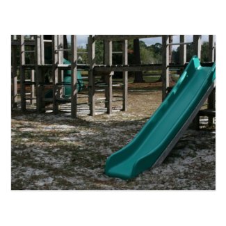 Green Playground slide, wood jungle gym Post Card