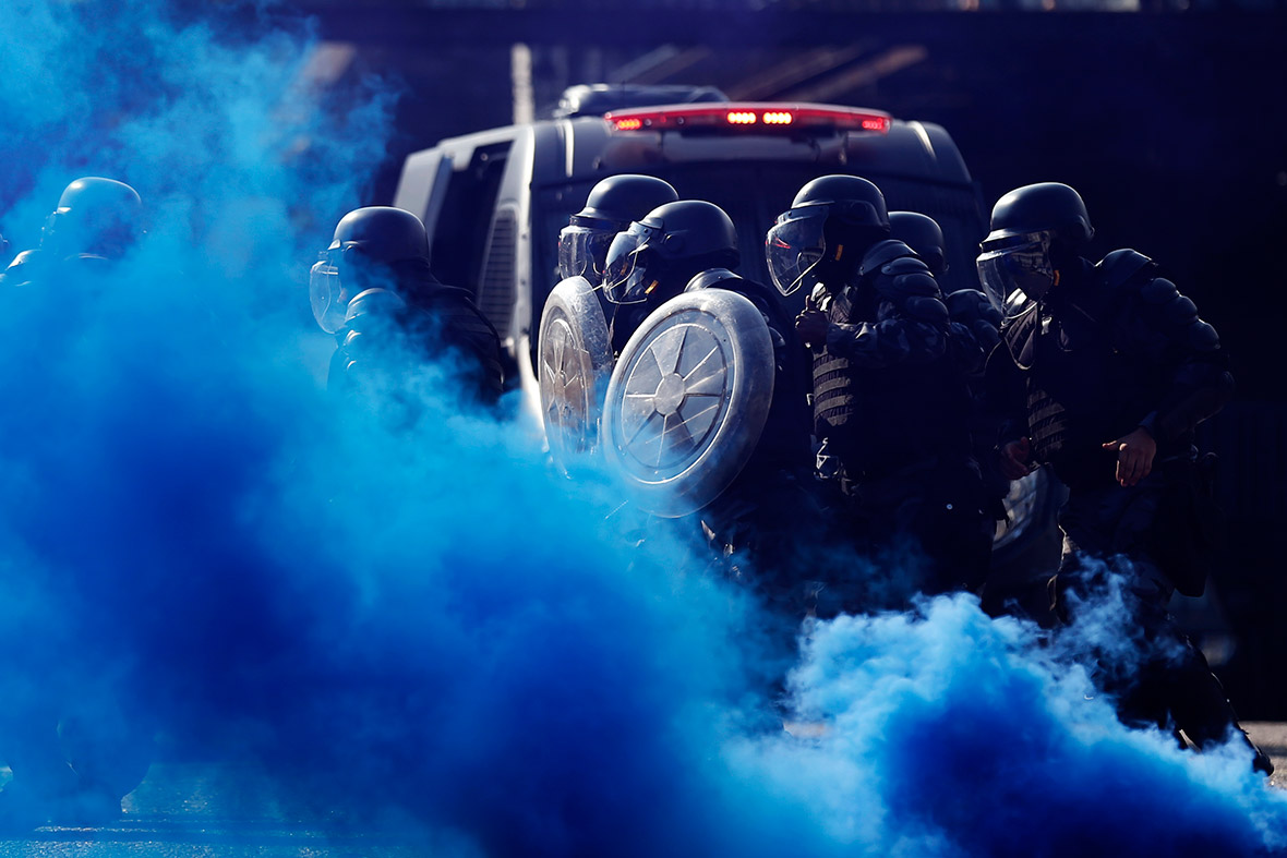 Riot police practise crowd control during an FBI-run training session for troops providing security for the 2014 World Cup, in Rio de Janeiro.