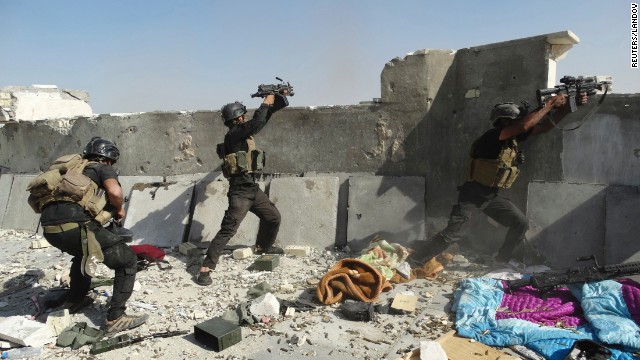 <strong>June 19:</strong> Members of Iraq's Special Operations Forces take their positions during clashes with the ISIS militant group Thursday, June 19, in Ramadi, Iraq. ISIS <a href='http://ift.tt/1ixj1Rt'>has been advancing in Iraq and Syria</a> as it seeks to create an Islamic caliphate in the region.